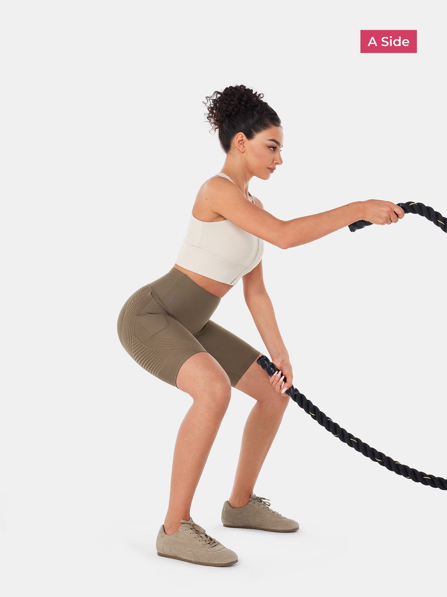 Short cycliste Body Sculpt à poches latérales de 23 cm 