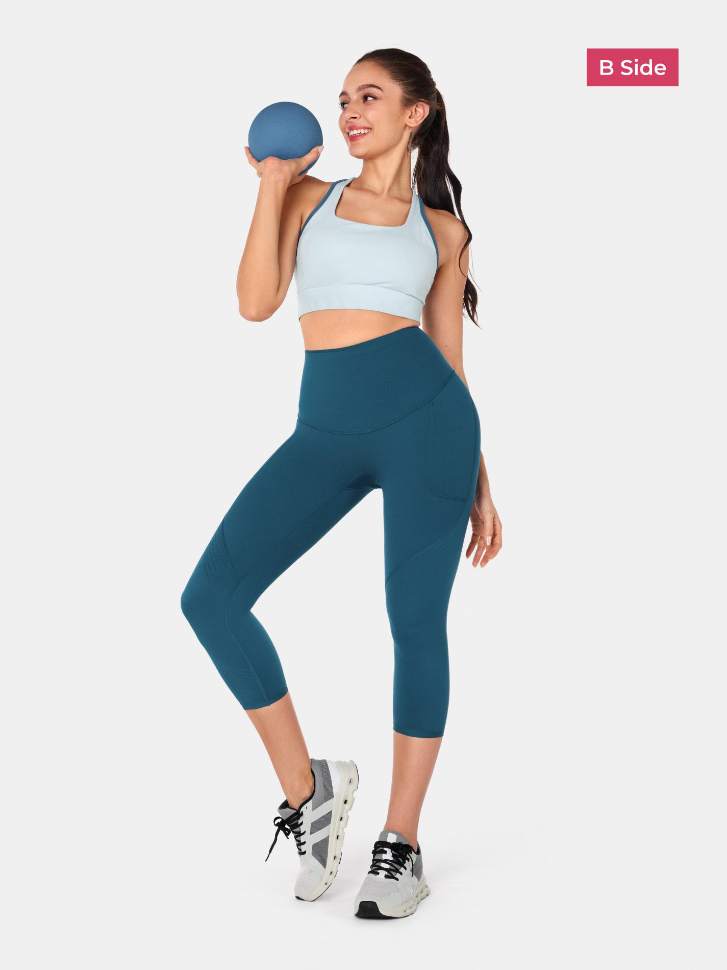 Legging capri à poches latérales Body Sculpt